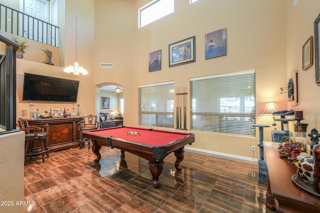 2115 N Cougar Ct, Casa Grande, AZ 85122 - playroom with visible vents, baseboards, arched walkways, a towering ceiling, and pool table