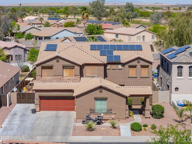 2115 N Cougar Ct, Casa Grande, AZ 85122 - view of front of home featuring a residential view, fence, a tile roof, and a gate