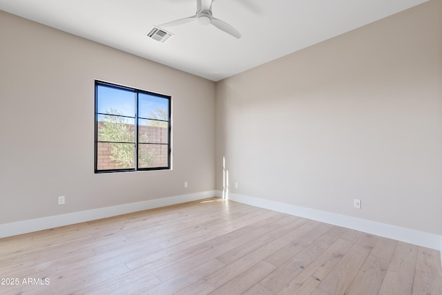 unfurnished room with ceiling fan and light hardwood / wood-style flooring