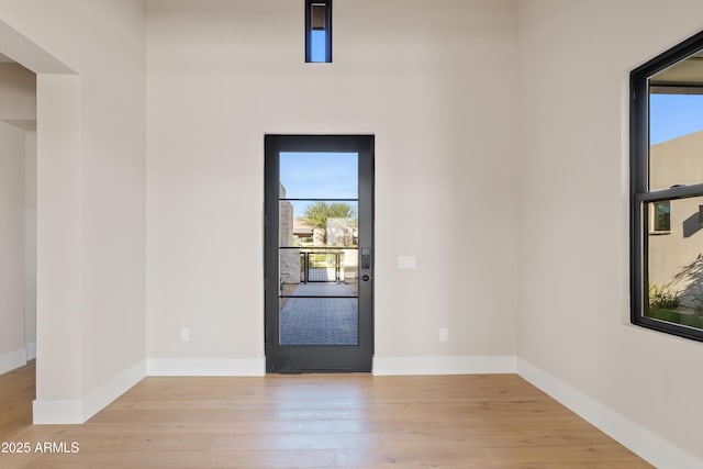 entrance foyer with light hardwood / wood-style flooring