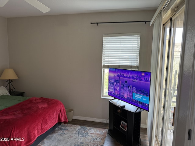 bedroom featuring ceiling fan and wood-type flooring