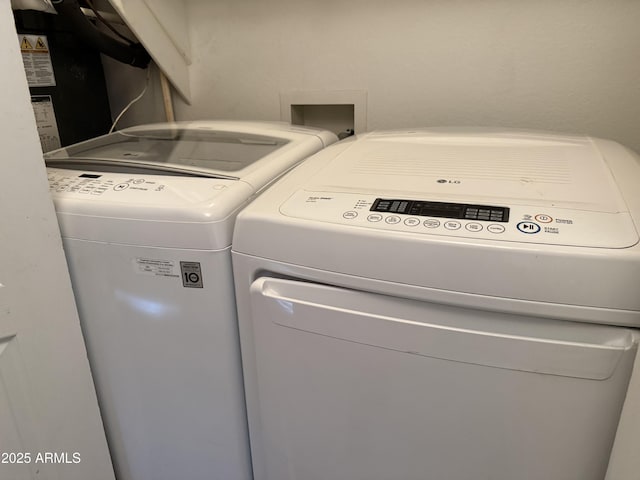 laundry area featuring independent washer and dryer