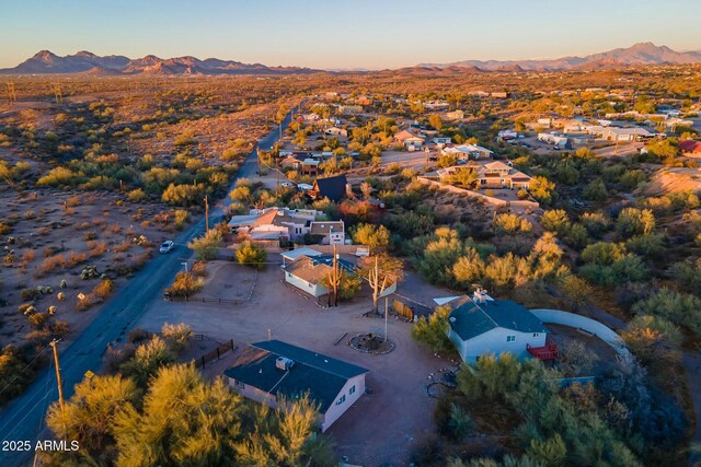 birds eye view of property with a residential view and a mountain view