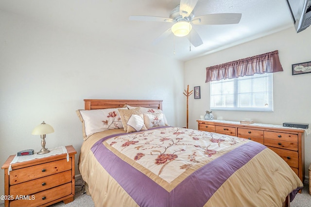 bedroom with light colored carpet and ceiling fan