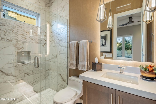 12311 E Black Rock Rd, Scottsdale, AZ 85255 - ensuite bathroom featuring healthy amount of natural light, a marble finish shower, vanity, and ceiling fan
