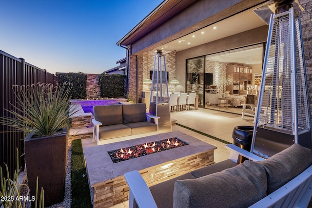 12311 E Black Rock Rd, Scottsdale, AZ 85255 - fenced backyard with an outdoor living space with a fire pit and a patio area