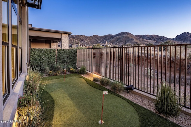 12311 E Black Rock Rd, Scottsdale, AZ 85255 - fenced backyard featuring an area to practice putting and a mountain view