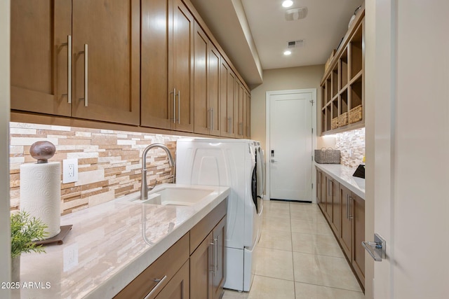 12311 E Black Rock Rd, Scottsdale, AZ 85255 - washroom with cabinet space, light tile patterned flooring, washing machine and dryer, and recessed lighting