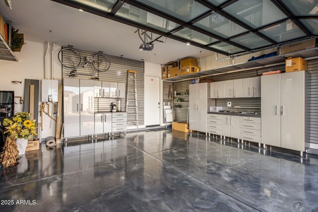 12311 E Black Rock Rd, Scottsdale, AZ 85255 - garage featuring a garage door opener and white fridge