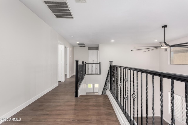 hallway featuring dark wood-type flooring