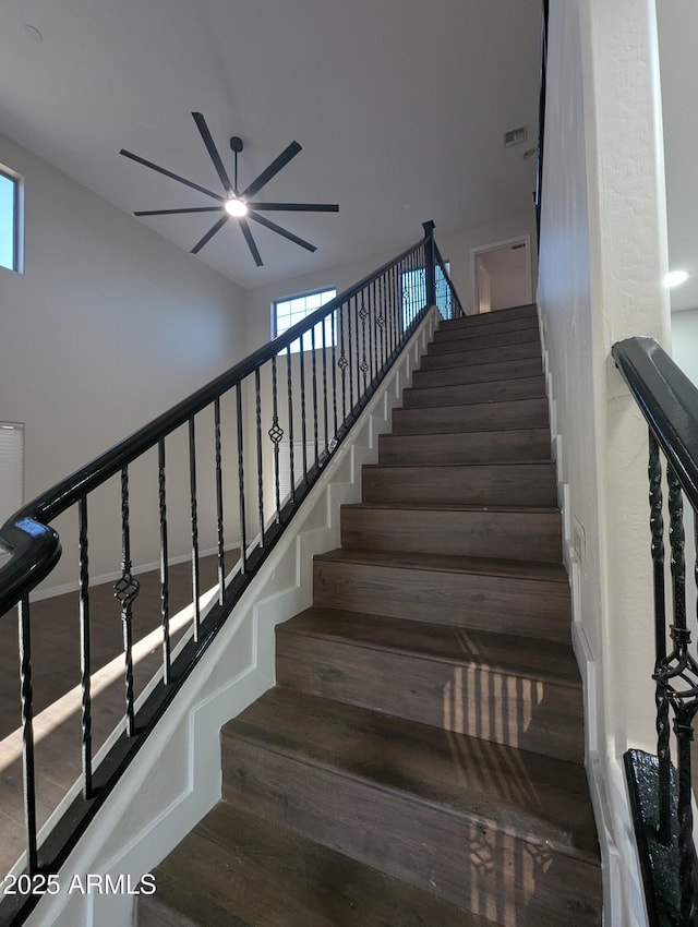 stairs featuring wood-type flooring