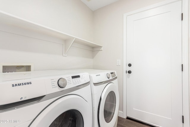 clothes washing area featuring dark hardwood / wood-style flooring and separate washer and dryer