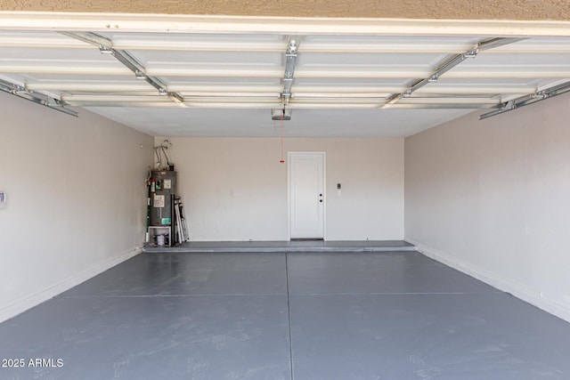 garage with a garage door opener and water heater