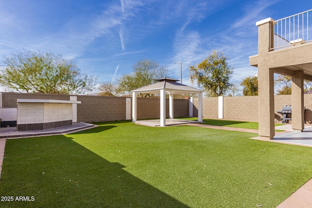 view of yard featuring a gazebo and a patio