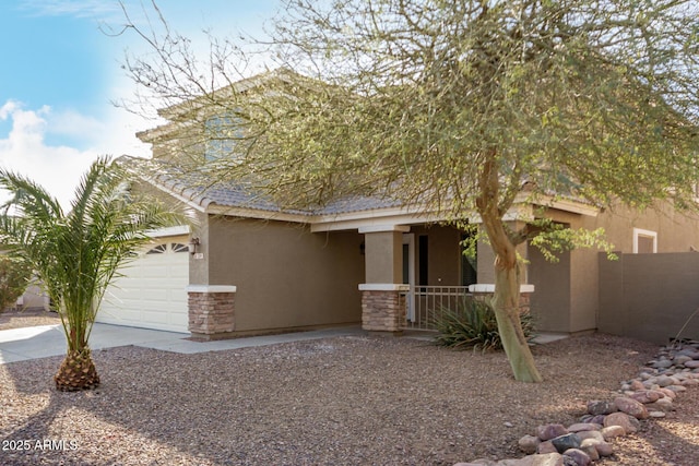 view of front of home with a garage