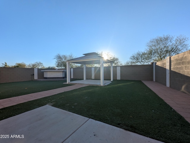 view of yard featuring a gazebo and a patio