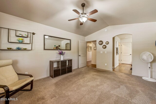2540 W Waters Edge Ln, Lakeside, AZ 85929 - living area with a ceiling fan, carpet flooring, arched walkways, and vaulted ceiling