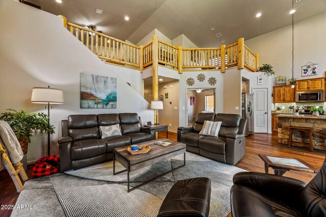 2540 W Waters Edge Ln, Lakeside, AZ 85929 - living area with dark wood-style floors, a towering ceiling, and recessed lighting