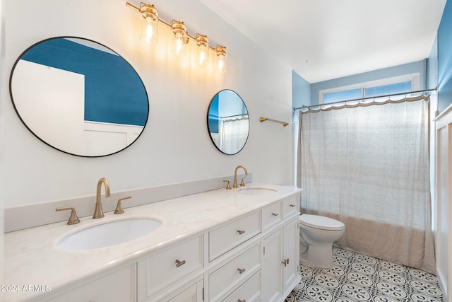 full bathroom featuring vanity, toilet, and shower / bathtub combination with curtain