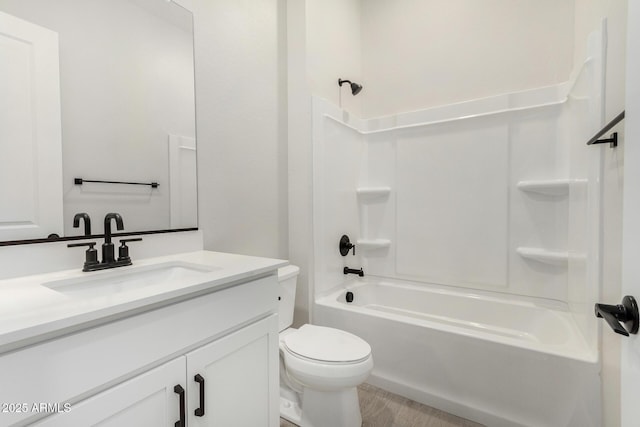 5664 N 205th Ln, Buckeye, AZ 85396 - bathroom featuring vanity, toilet, bathtub / shower combination, and wood finished floors