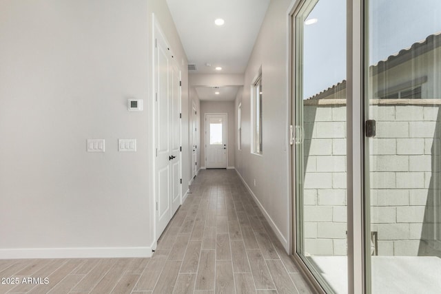 5664 N 205th Ln, Buckeye, AZ 85396 - hall featuring baseboards, light wood-style floors, and recessed lighting