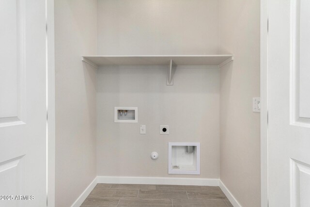 5664 N 205th Ln, Buckeye, AZ 85396 - laundry area featuring electric dryer hookup, hookup for a washing machine, hookup for a gas dryer, baseboards, and wood finish floors