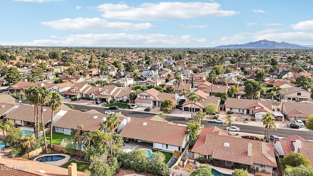 drone / aerial view with a residential view and a mountain view