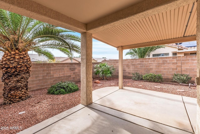 view of patio with a fenced backyard