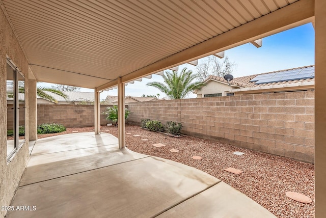 view of patio with a fenced backyard