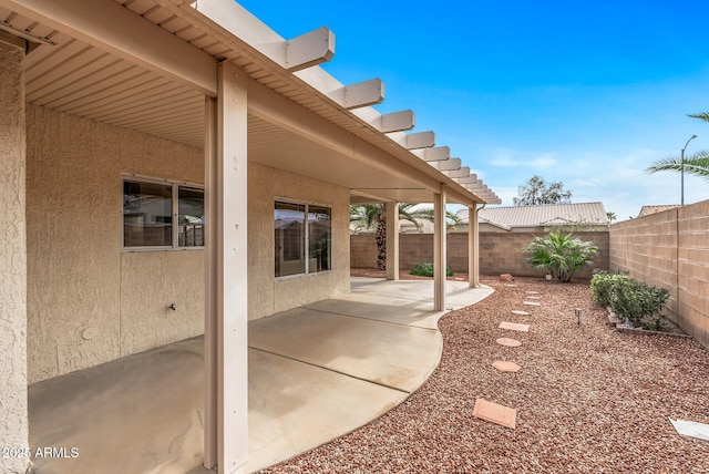 view of patio featuring a fenced backyard