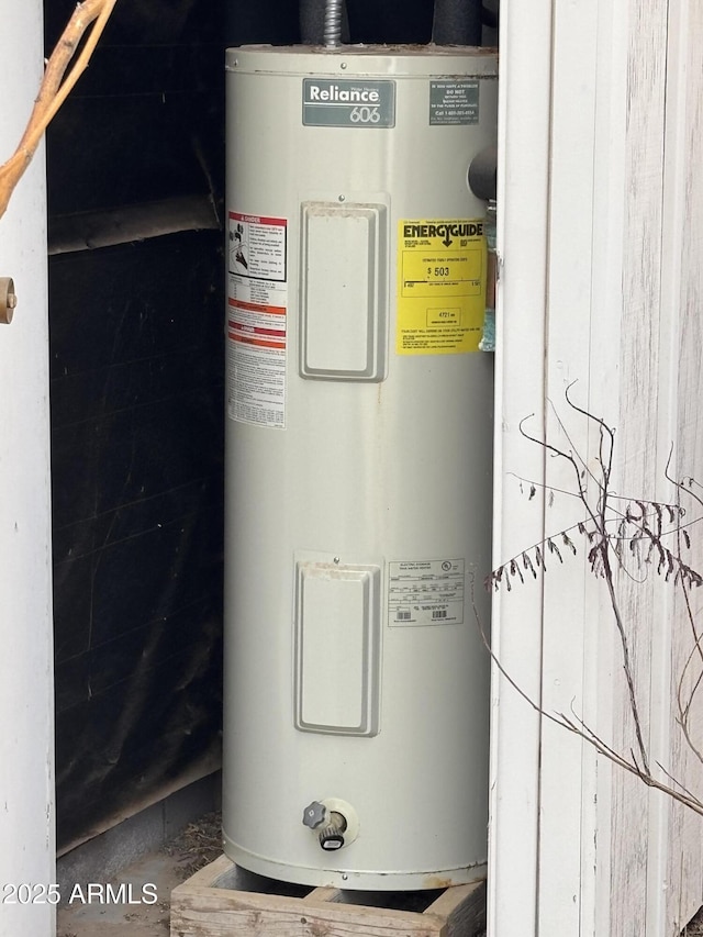 utility room featuring electric water heater