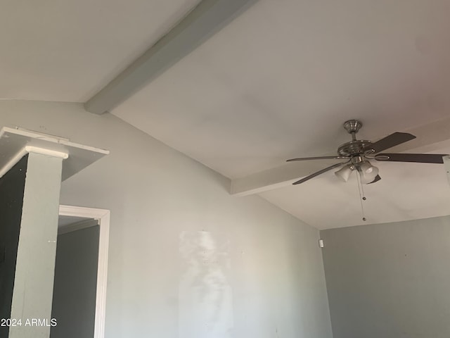 room details with ceiling fan and beam ceiling