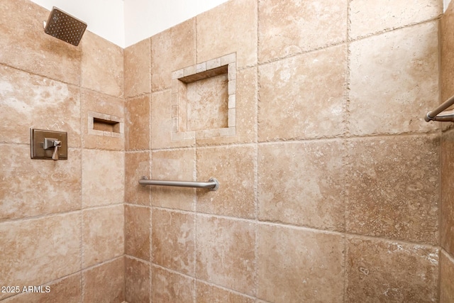 details featuring a tile shower