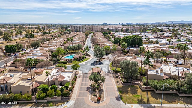 birds eye view of property featuring a residential view and a mountain view