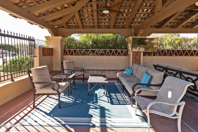 view of patio / terrace featuring a gazebo, a ceiling fan, fence, and an outdoor hangout area