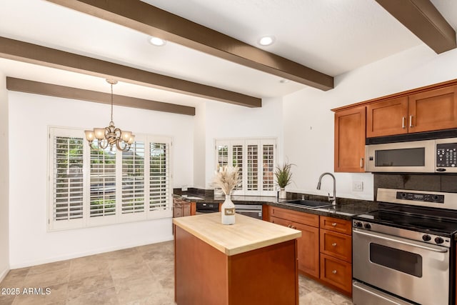 kitchen featuring butcher block counters, beam ceiling, a chandelier, a sink, and appliances with stainless steel finishes