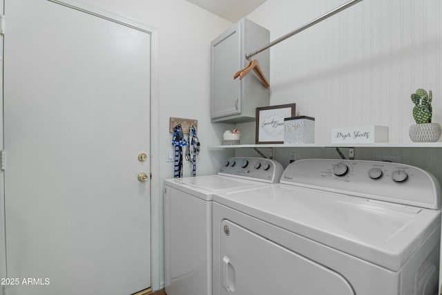 laundry area featuring cabinet space and independent washer and dryer