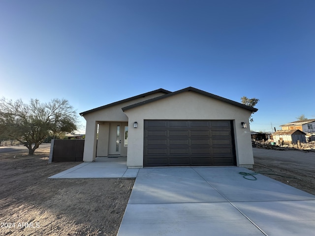 view of front of property with a garage