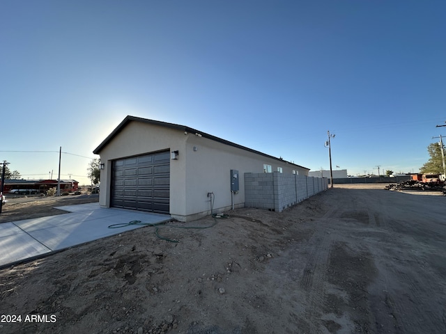 view of home's exterior with a garage