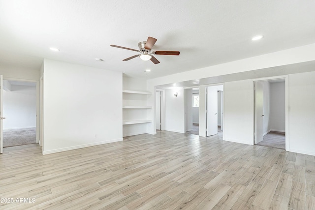 3743 E Coronado Rd, Phoenix, AZ 85008 - unfurnished living room with recessed lighting, ceiling fan, light wood-style floors, and baseboards