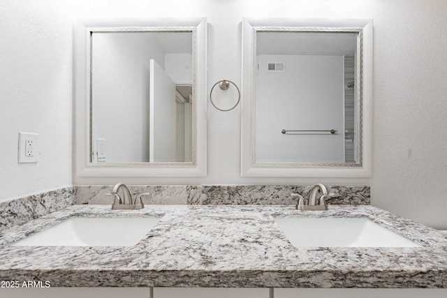 3743 E Coronado Rd, Phoenix, AZ 85008 - bathroom featuring double vanity, a sink, and visible vents