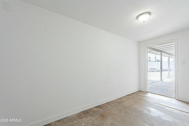 3743 E Coronado Rd, Phoenix, AZ 85008 - spare room with concrete flooring and baseboards