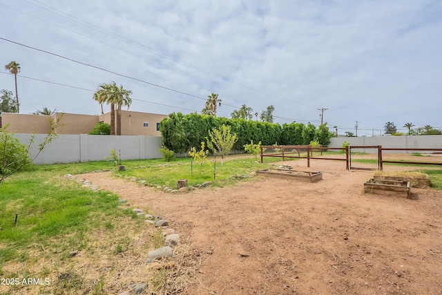 3743 E Coronado Rd, Phoenix, AZ 85008 - view of yard with a garden and fence