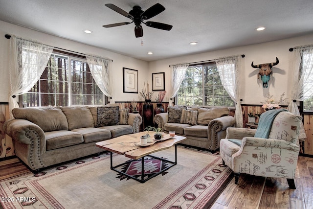 8894 W Lufkin Dr, Pine, AZ 85544 - living room with wood finished floors, ceiling fan, and recessed lighting