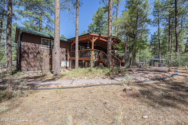 8894 W Lufkin Dr, Pine, AZ 85544 - rear view of house featuring stairs