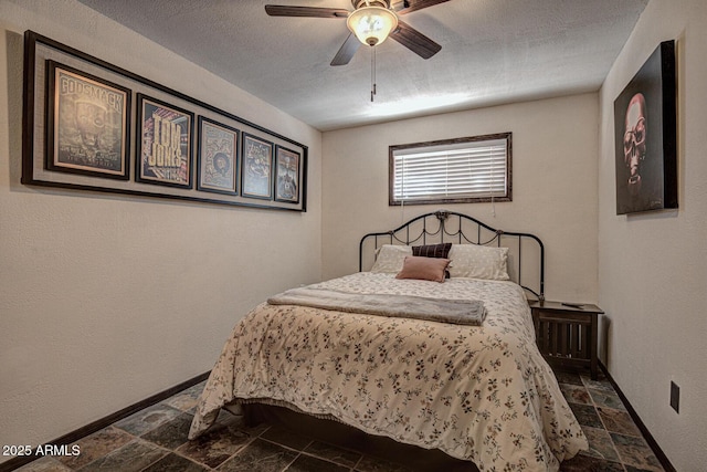 8894 W Lufkin Dr, Pine, AZ 85544 - bedroom featuring stone tile floors and ceiling fan