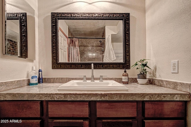 8894 W Lufkin Dr, Pine, AZ 85544 - full bath with a textured wall, vanity, and a shower with shower curtain