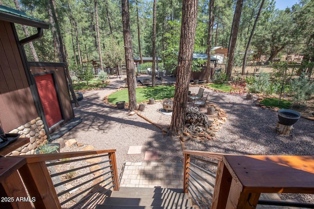 8894 W Lufkin Dr, Pine, AZ 85544 - view of yard featuring an outdoor fire pit and a patio