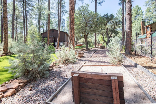 8894 W Lufkin Dr, Pine, AZ 85544 - view of yard featuring a shed and a garden
