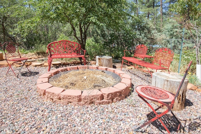 8894 W Lufkin Dr, Pine, AZ 85544 - view of yard featuring a fire pit and a patio